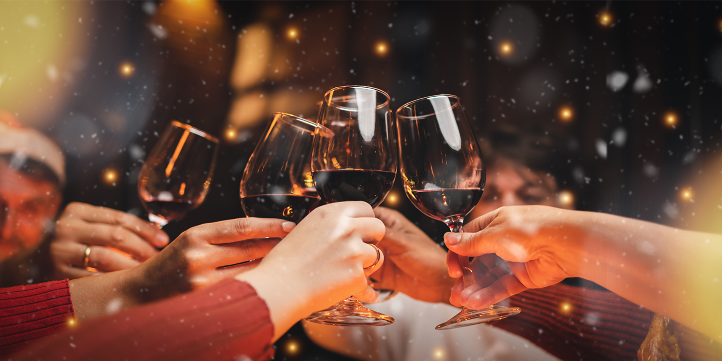 Image of a group of people clinking wine glasses