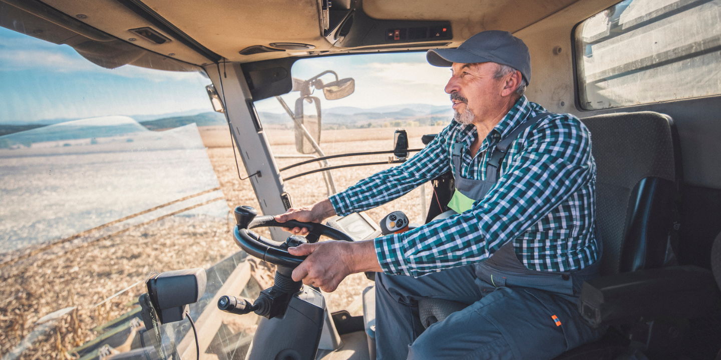 Image of a man driving a tractor